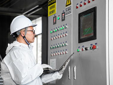 an skilled technician commissioning the reacting equipment in our factory 